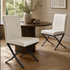 Two cream faux leather dining chairs with black steel cross legs – Chair Outlet