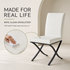 Cream leather-effect dining chairs with black steel legs, sold in sets of 2 or 4
