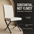 Cream faux leather dining chair with padded seat and black metal cross-leg frame